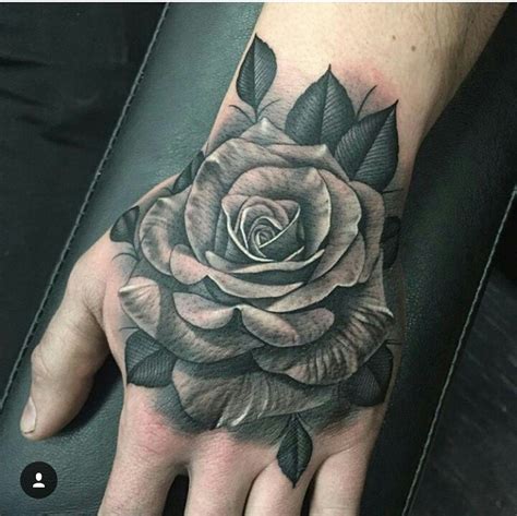 rose hand tattoo